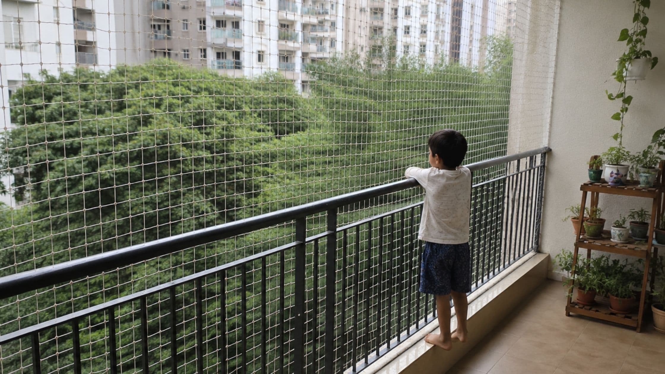 Child safety net installed across a residential balcony